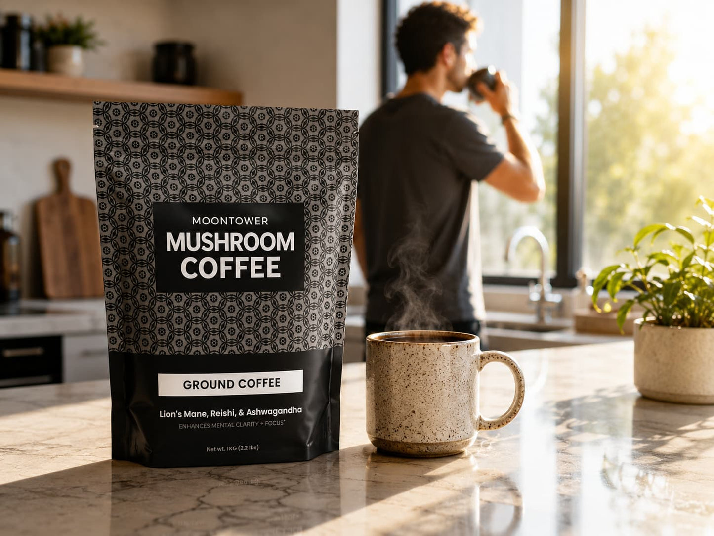 Moontower Mushroom Coffee in a bright modern kitchen with a ceramic coffee mug. Freshly roasted real ground coffee blended with Lion's Mane, Reishi, and Ashwagandha for clean energy, mental clarity, and smooth focus.